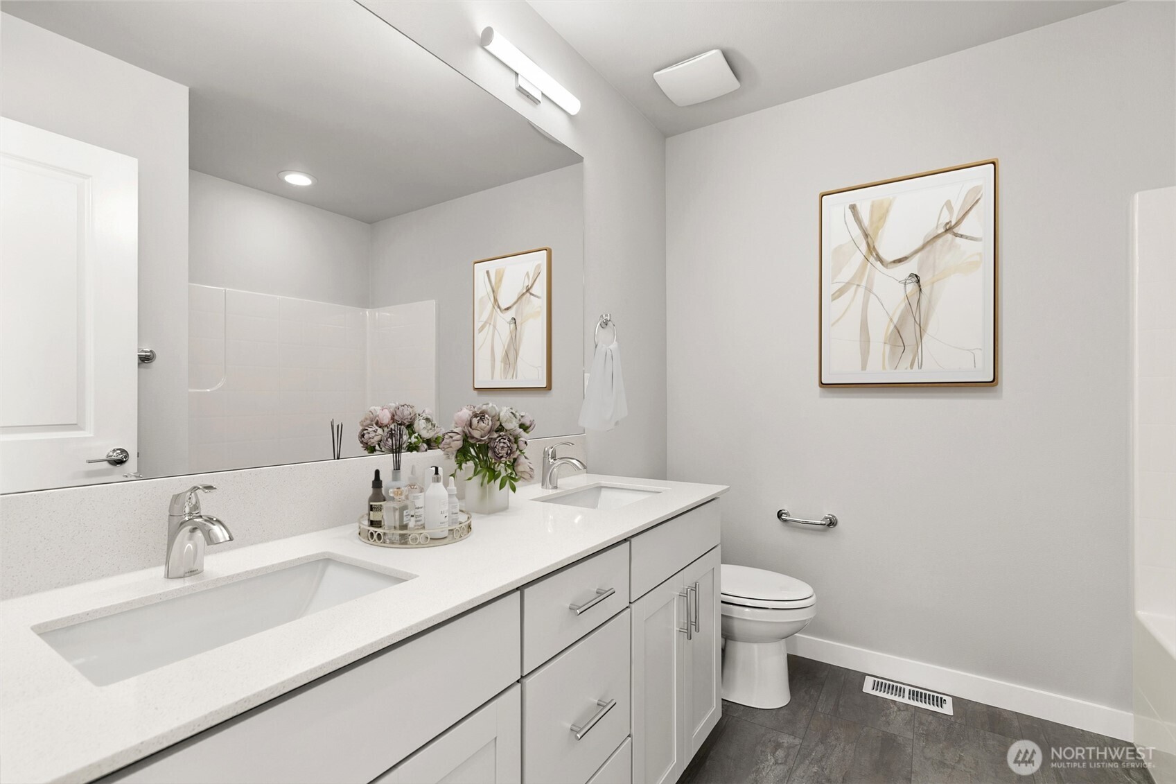 12510 Southeast 256th Place, Unit 7 Kent, WA 98030 - Photo 26 of 39 a bathroom with a toilet sink and mirror