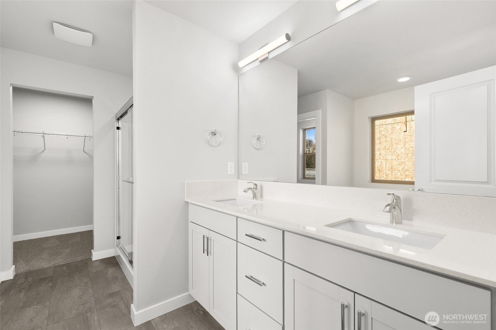 12510 Southeast 256th Place, Unit 7 Kent, WA 98030 - Photo 29 of 39 a bathroom with a sink and a mirror