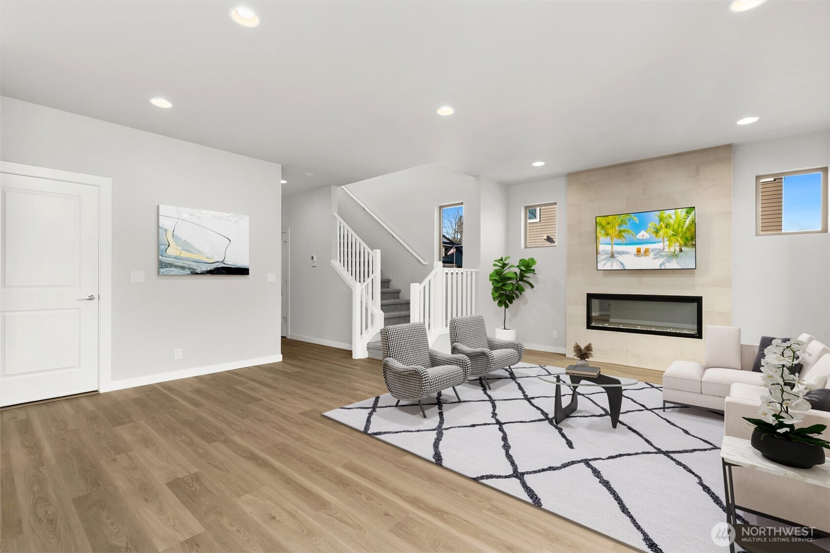12510 Southeast 256th Place, Unit 7 Kent, WA 98030 - Photo 3 of 39 a living room with furniture and a painting on the wall