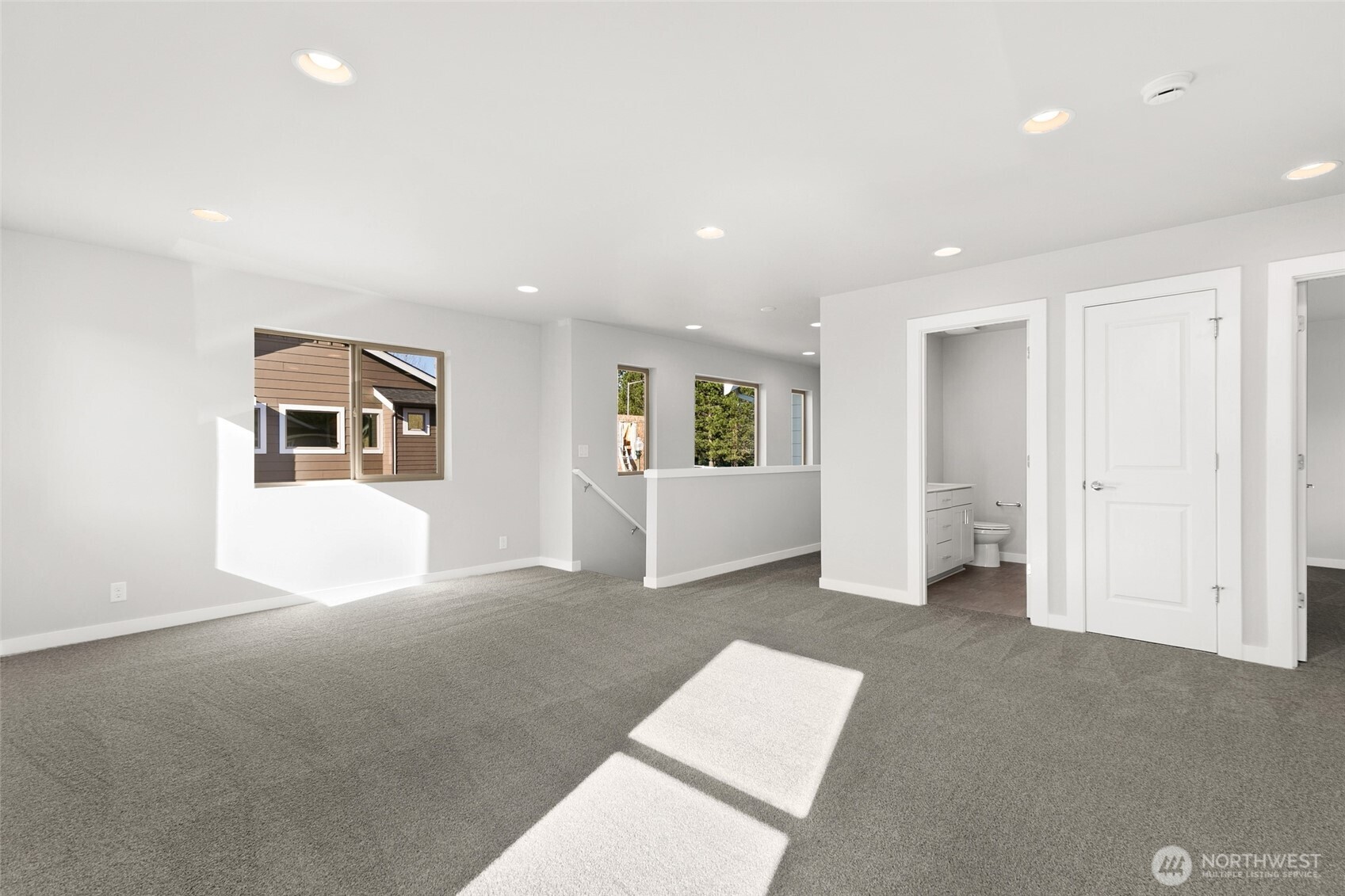 12510 Southeast 256th Place, Unit 7 Kent, WA 98030 - Photo 35 of 39 a view of an empty room with a window