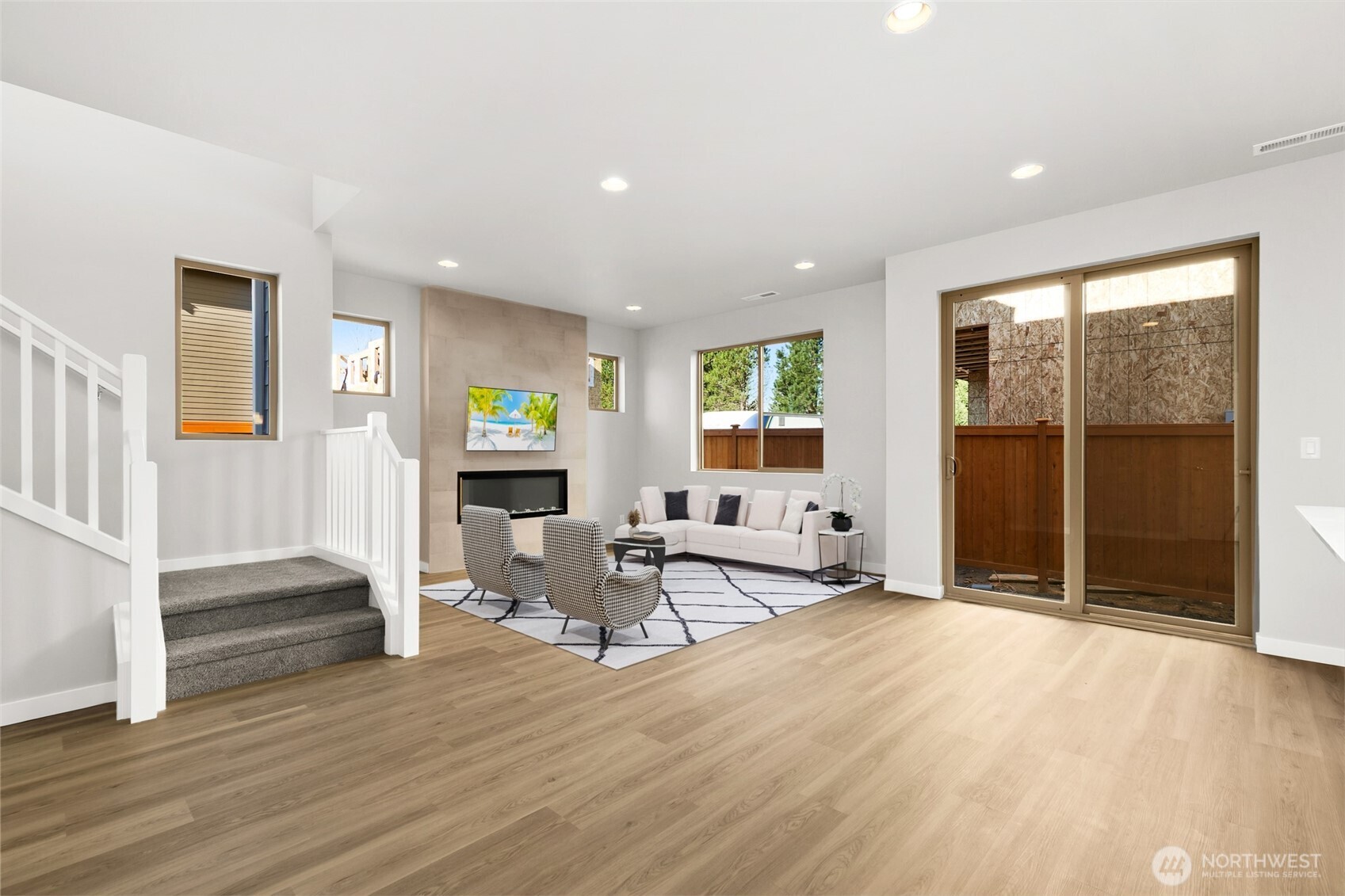 12510 Southeast 256th Place, Unit 7 Kent, WA 98030 - Photo 6 of 39 a living room with fireplace furniture and a wooden floor