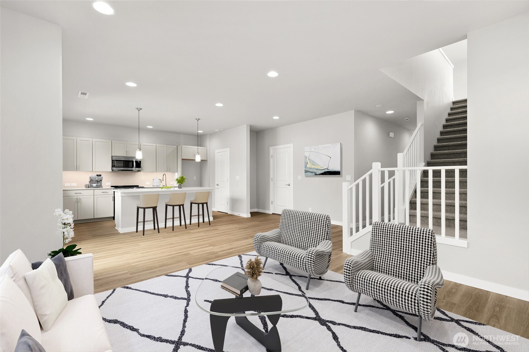 12510 Southeast 256th Place, Unit 7 Kent, WA 98030 - Photo 8 of 39 a living room with furniture and kitchen view