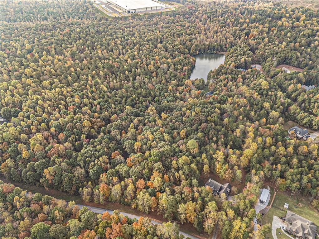599 Primrose Lane Pendergrass, GA 30567 - Photo 5 of 12 a bathroom with a shower curtain