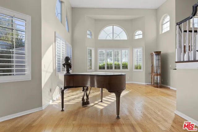 a view of a livingroom with furniture and a window