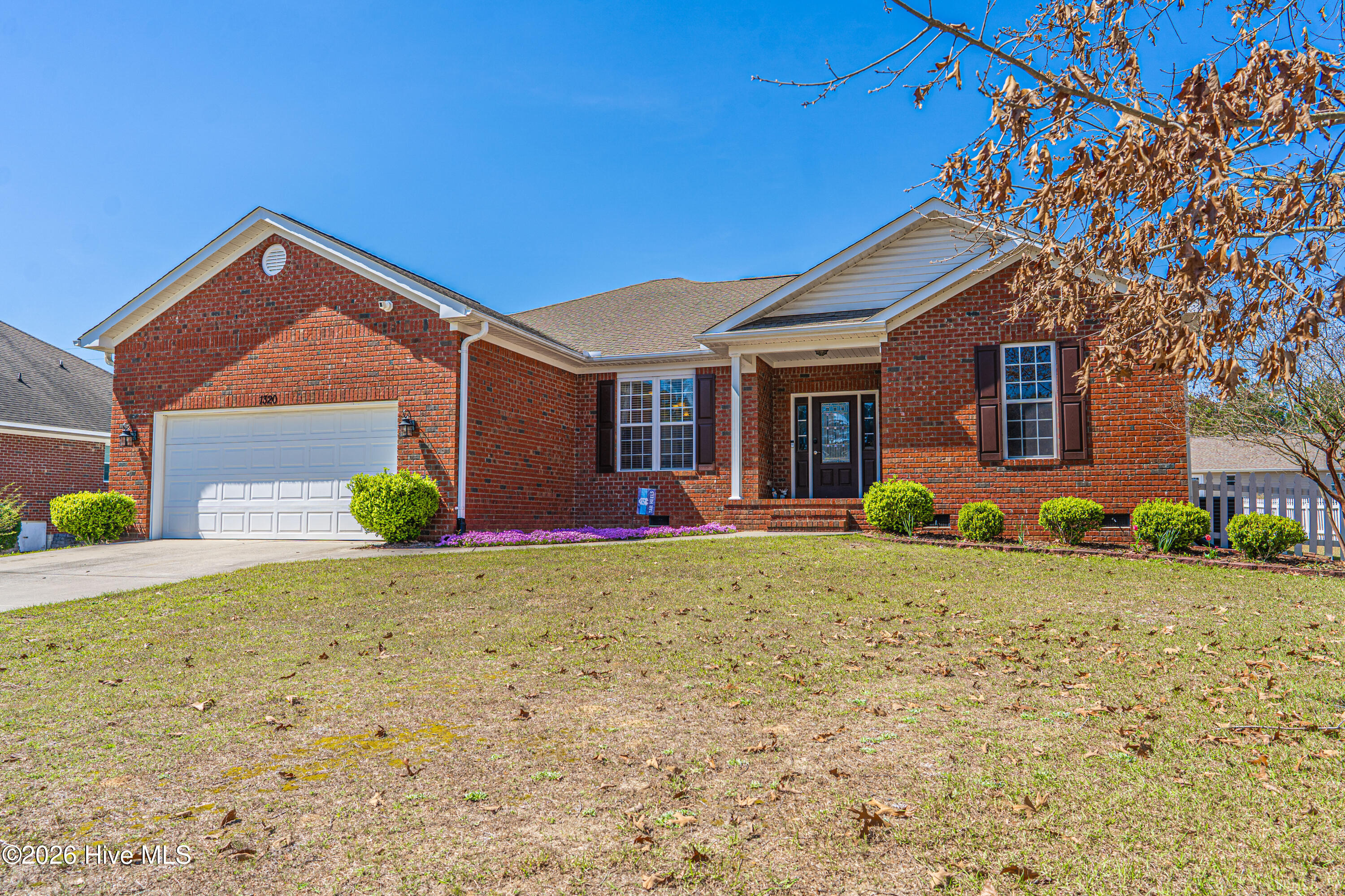 1320 Burning Tree Road Pinehurst, NC 28374 - Photo 2 of 65 Concrete Drive set back from road