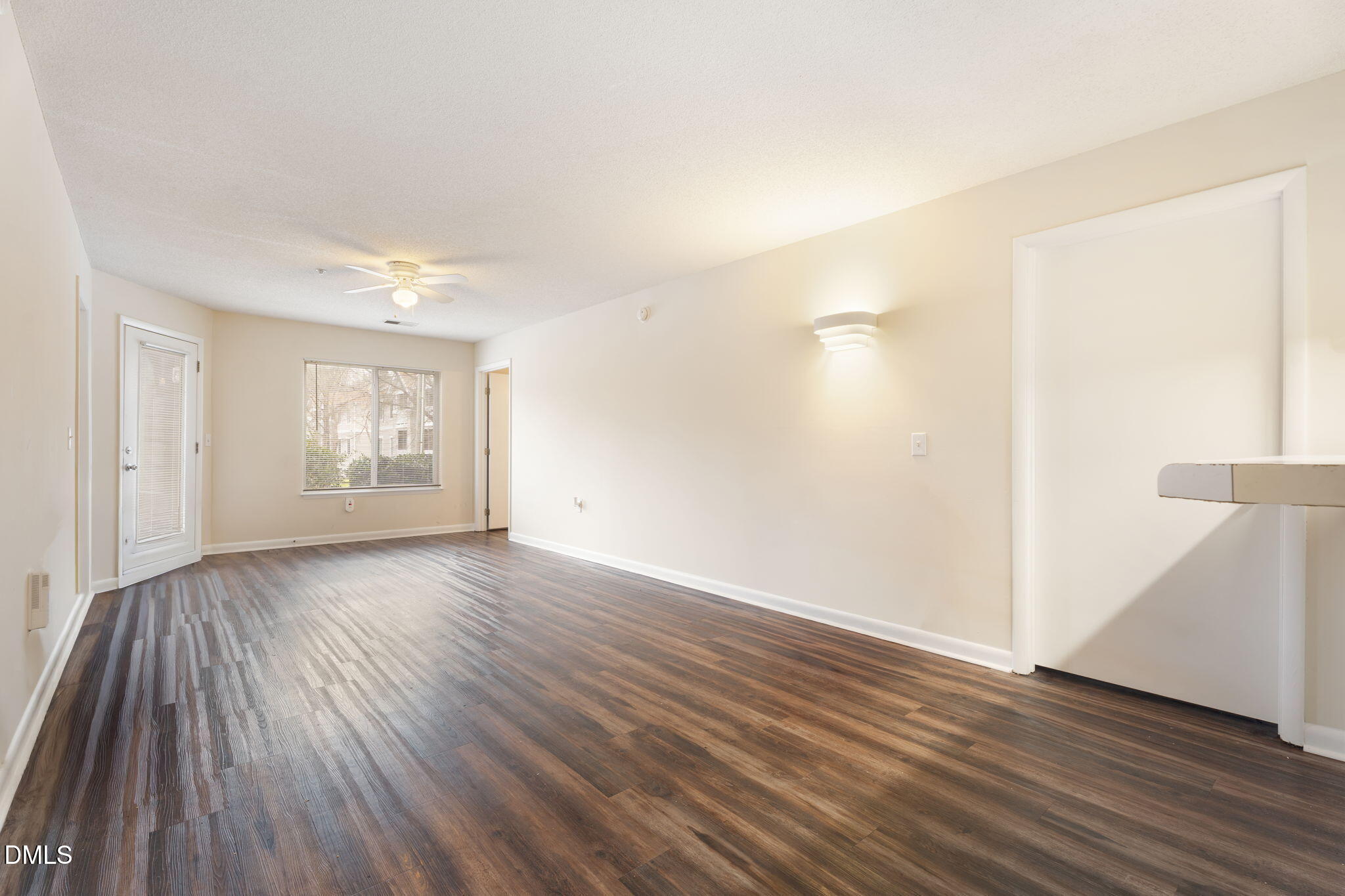 1420 Collegiate Circle Raleigh, NC 27606 - Photo 15 of 30 an empty room with wooden floor and windows