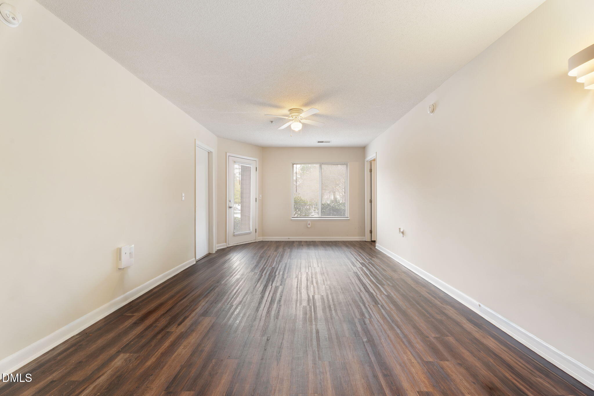 1420 Collegiate Circle Raleigh, NC 27606 - Photo 16 of 30 an empty room with wooden floor and windows