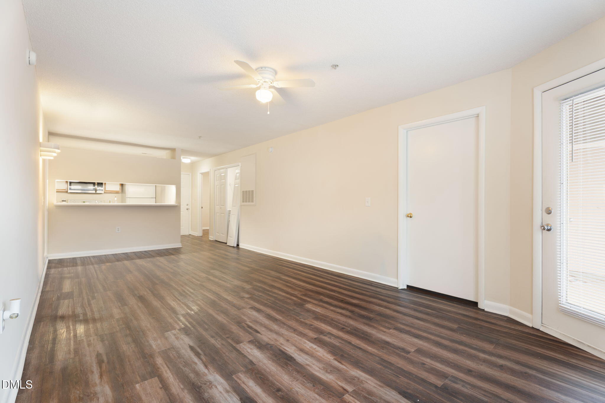 1420 Collegiate Circle Raleigh, NC 27606 - Photo 17 of 30 wooden floor in an empty room with a window