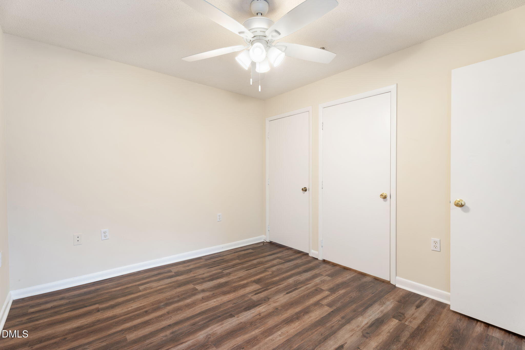 1420 Collegiate Circle Raleigh, NC 27606 - Photo 8 of 30 a view of an empty room with wooden floor