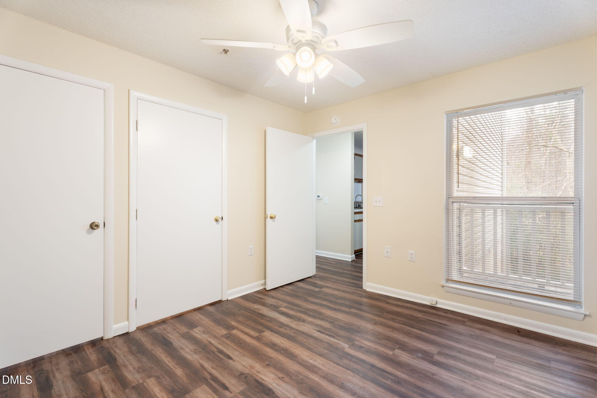 1420 Collegiate Circle Raleigh, NC 27606 - Photo 9 of 30 wooden floor in an empty room with a window
