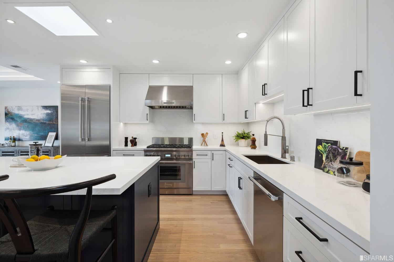 65 Westgate Drive San Francisco, CA 94127 - Photo 14 of 51 a kitchen with a sink a stove and chairs