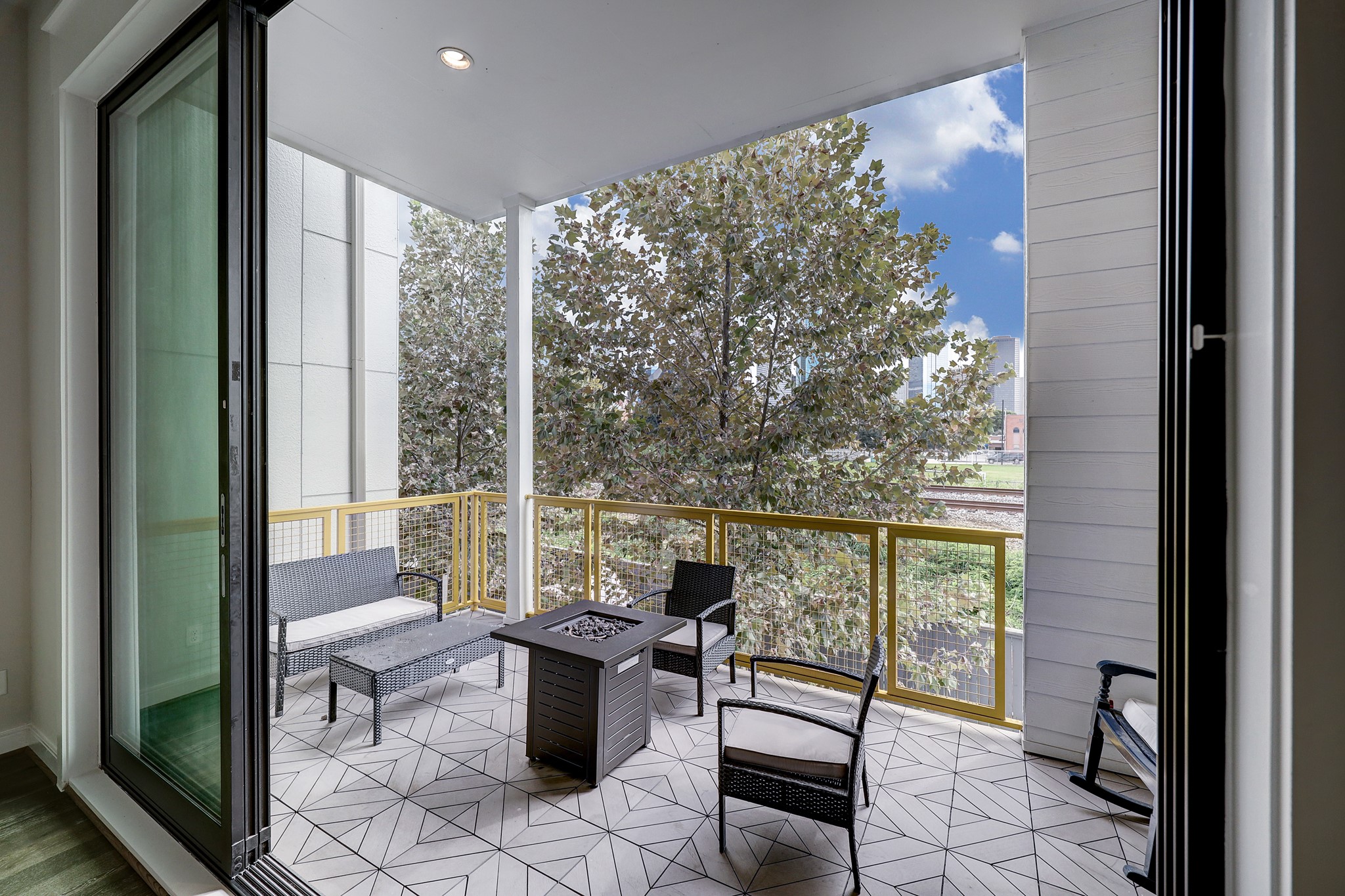 1203 Hickory Street, Unit D Houston, TX 77007 - Photo 14 of 23 a living room with furniture and large windows