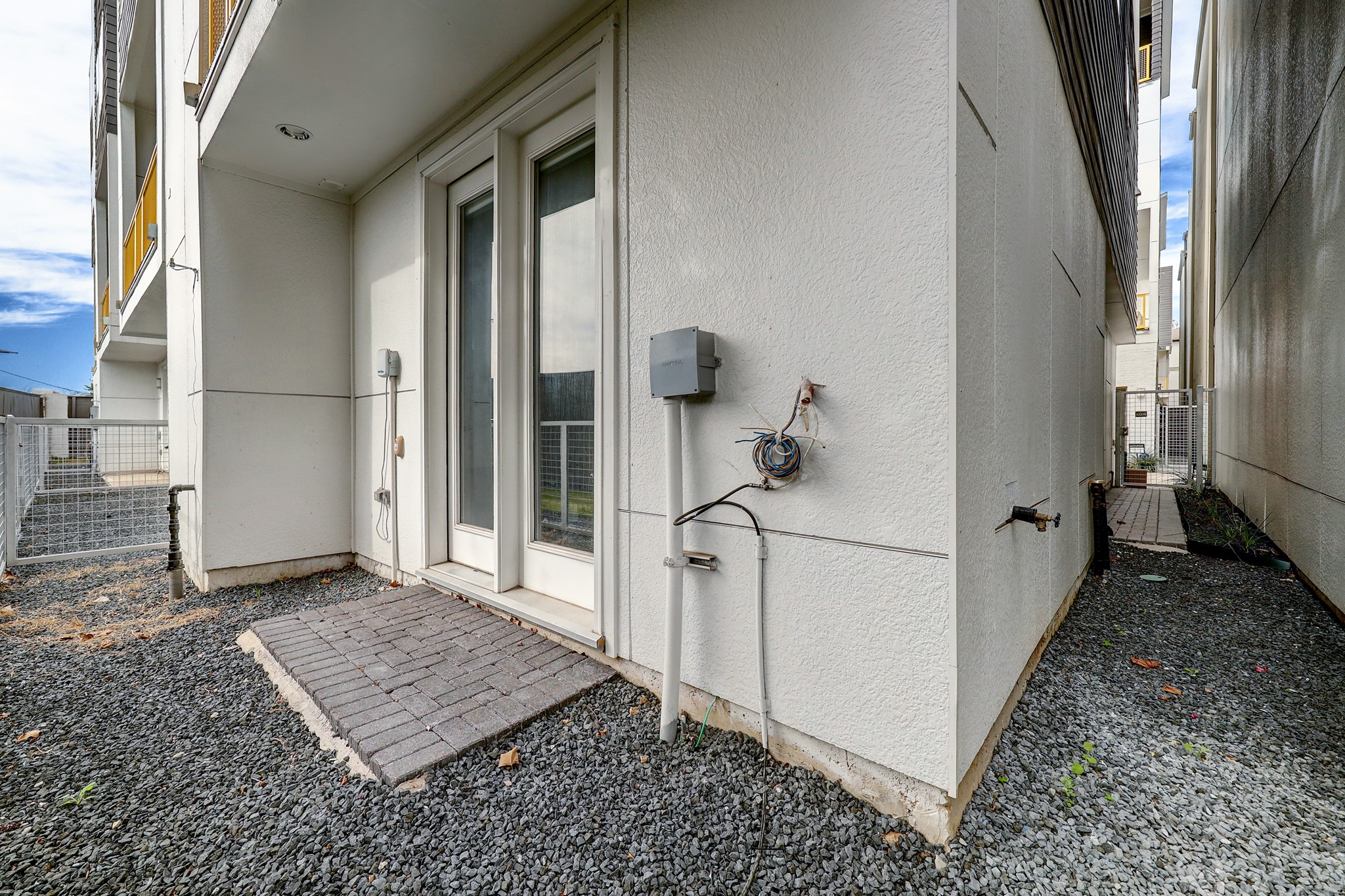 1203 Hickory Street, Unit D Houston, TX 77007 - Photo 21 of 23 a view of a hallway view with staircase