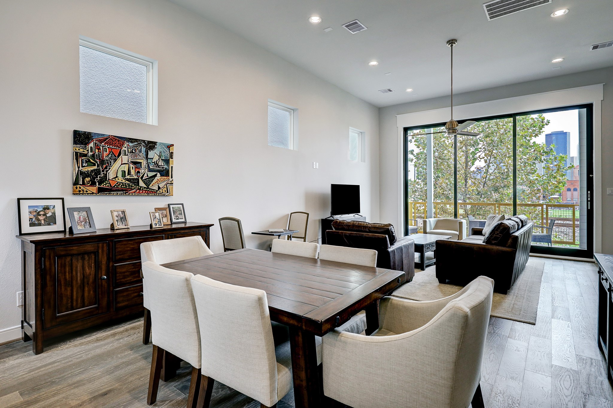 1203 Hickory Street, Unit D Houston, TX 77007 - Photo 9 of 23 a view of a dining room with furniture window and outside view