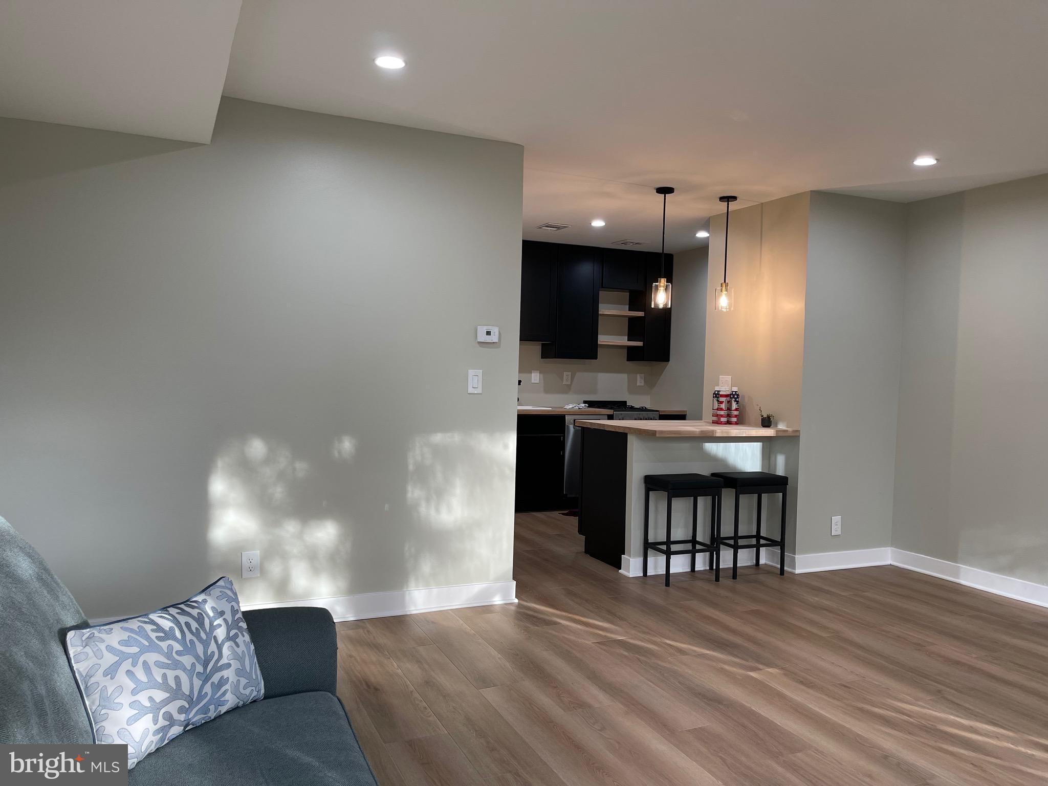 620 3rd Street Southwest Washington, DC 20024 - Photo 13 of 44 a view of kitchen and dining room with furniture