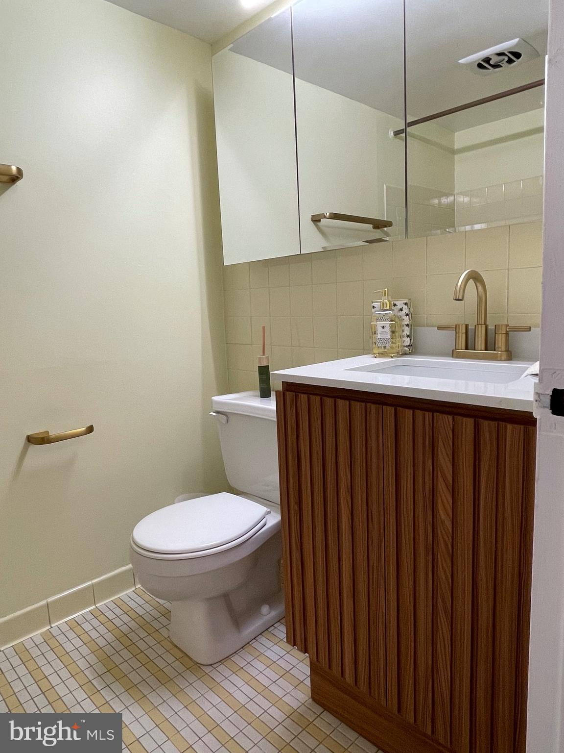 620 3rd Street Southwest Washington, DC 20024 - Photo 21 of 44 a bathroom with a sink toilet and shower