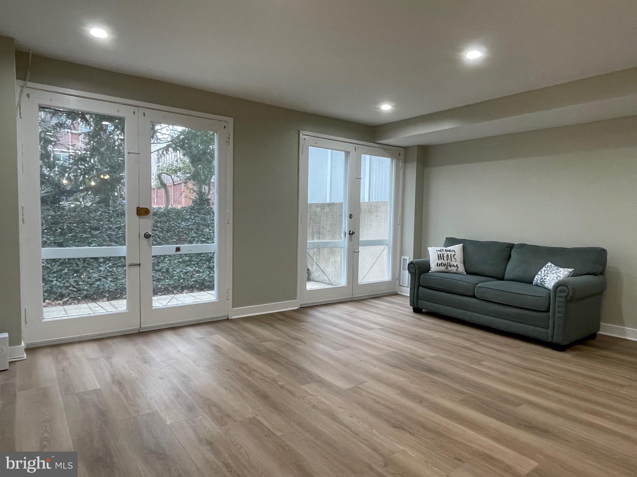 620 3rd Street Southwest Washington, DC 20024 - Photo 24 of 44 a living room with furniture and large windows