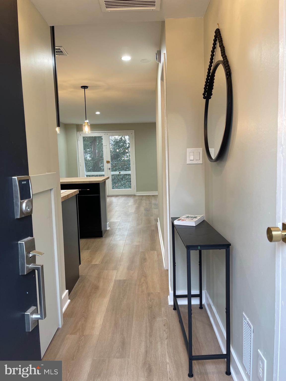 620 3rd Street Southwest Washington, DC 20024 - Photo 3 of 44 a view of a bathroom with a sink and mirror