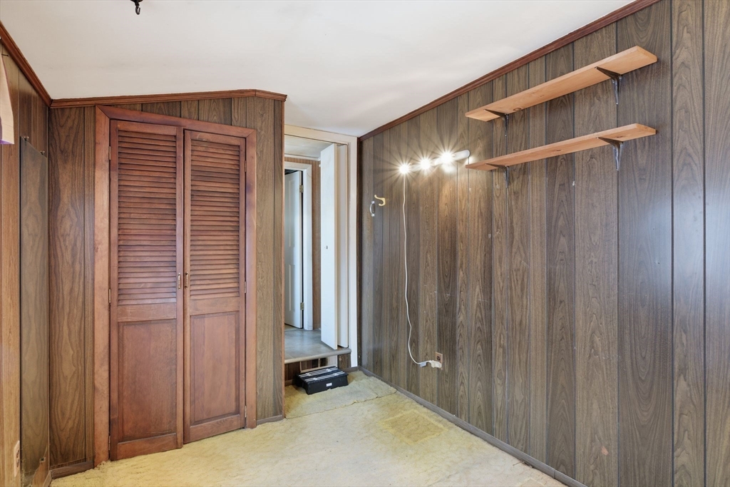 138 Warrenton Street Springfield, MA 01109 - Photo 20 of 33 a view of a room with a wooden walls