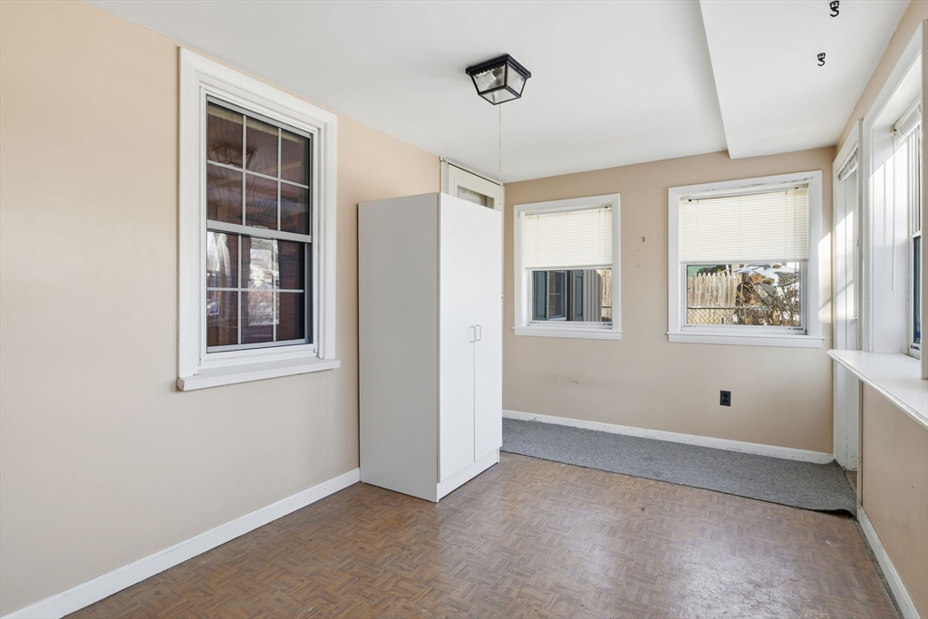 138 Warrenton Street Springfield, MA 01109 - Photo 4 of 33 a view of an empty room with a window