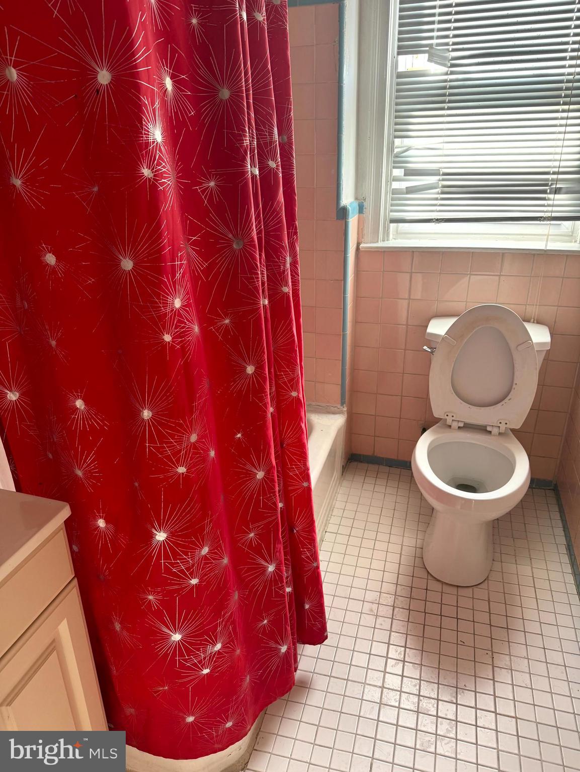 1629 Murdoch Road, Unit B2 Philadelphia, PA 19150 - Photo 6 of 7 a bathroom with a toilet and a shower