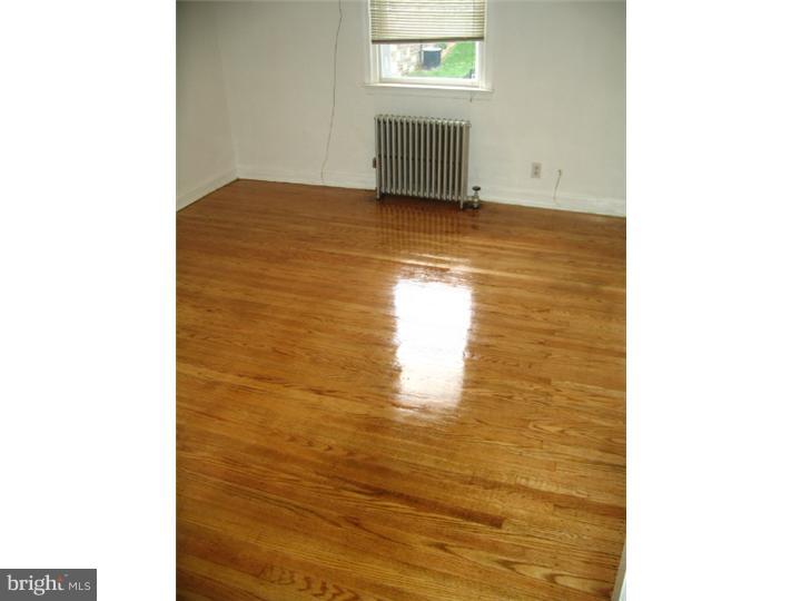 1629 Murdoch Road, Unit B2 Philadelphia, PA 19150 - Photo 7 of 9 a view of empty room with window