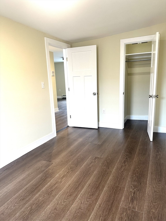 15 Clark Street, Unit 3 Boston, MA 02113 - Photo 4 of 8 a view of empty room with wooden floor