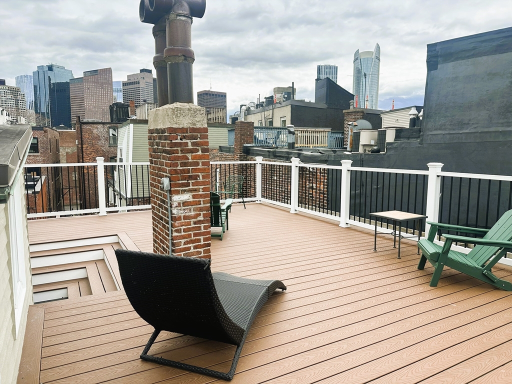 15 Clark Street, Unit 3 Boston, MA 02113 - Photo 8 of 8 a view of a terrace with sitting area