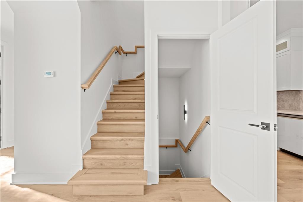 744 Crystal Bay Road Villa Rica, GA 30180 - Photo 25 of 69 a view of a hallway with staircase