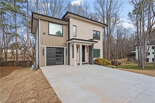 a front view of a house with stairs