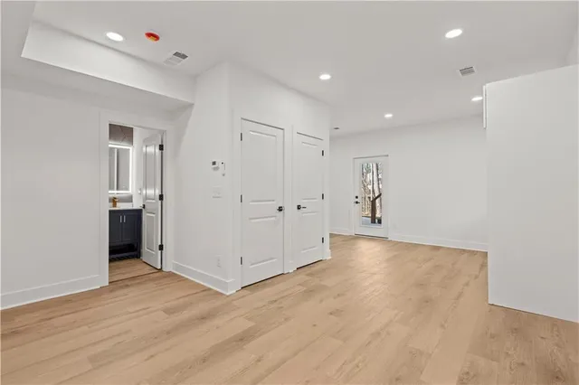 a view of backyard with tall trees