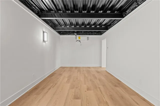 a picture of a bathroom with a shower