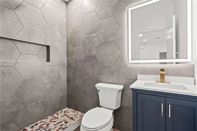 an aerial view of a house with yard swimming pool and outdoor seating