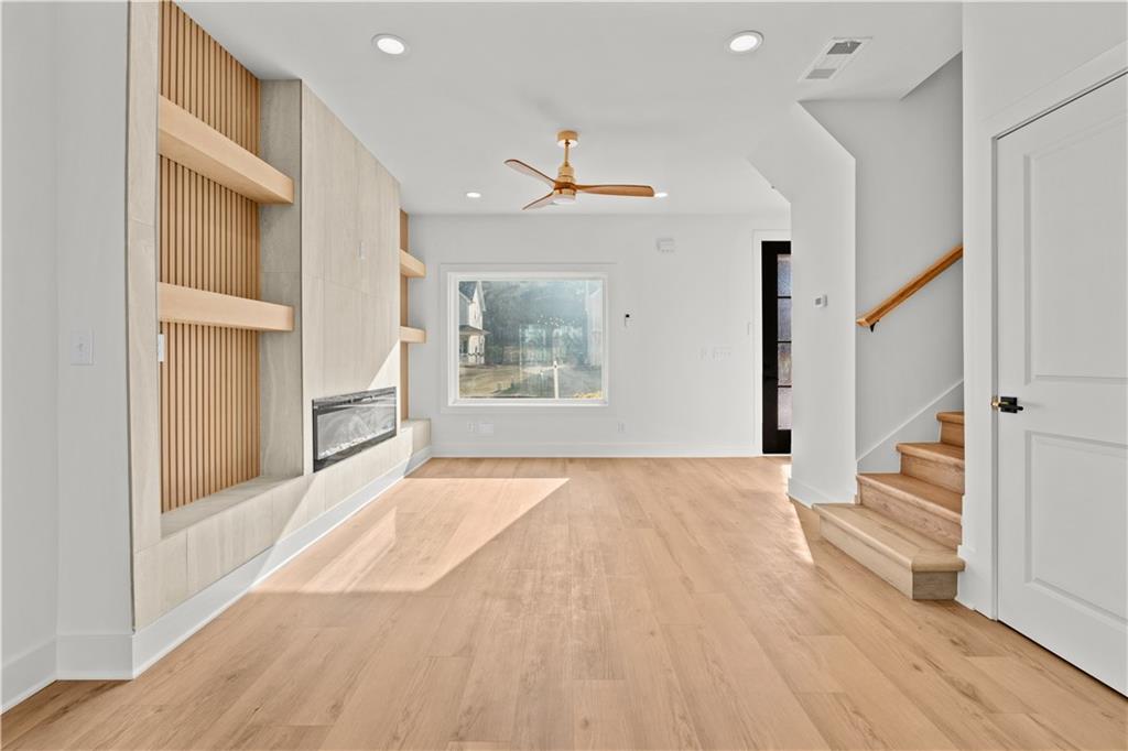 744 Crystal Bay Road Villa Rica, GA 30180 - Photo 9 of 69 a view of an empty room and wooden floor