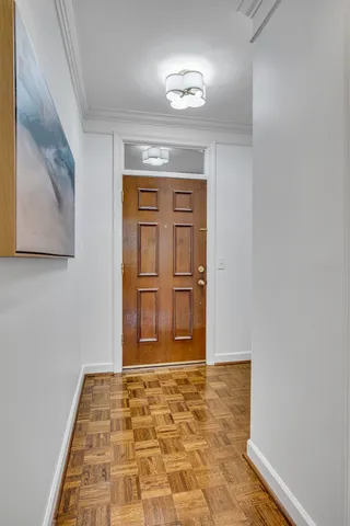 a outdoor dining space with furniture and wooden floor