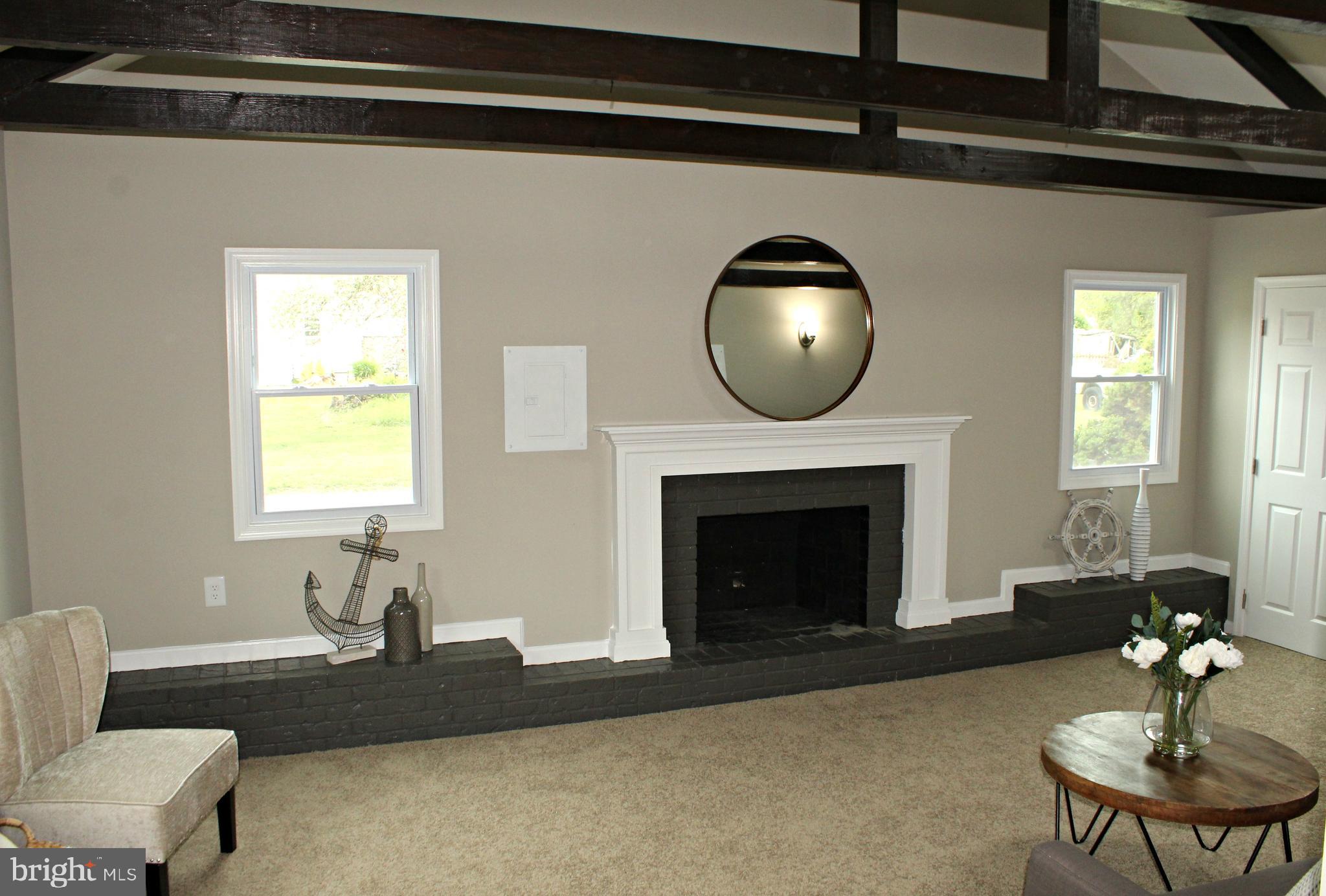 Wood burnin fireplace in family room!