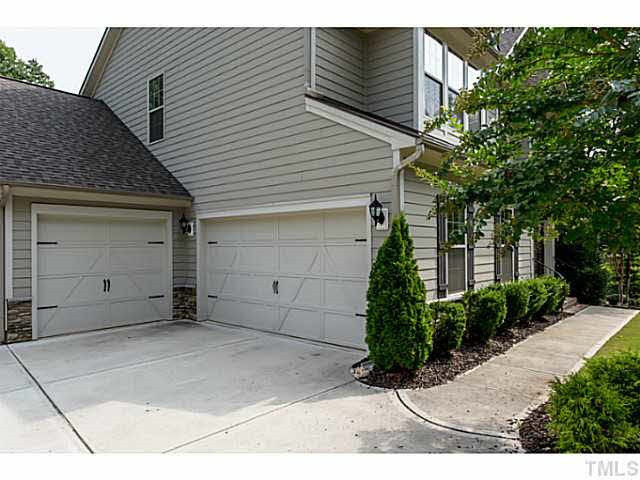 This home has an expansive three-car garage. Exterior Front