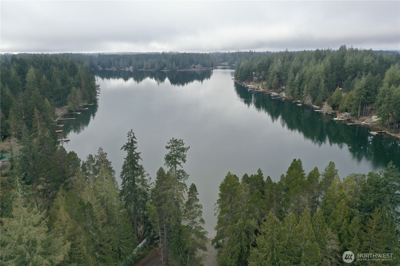 721 East Phillips Lake Loop Road Shelton, WA 98584 - Photo 21 of 30 a view of a lake from a yard