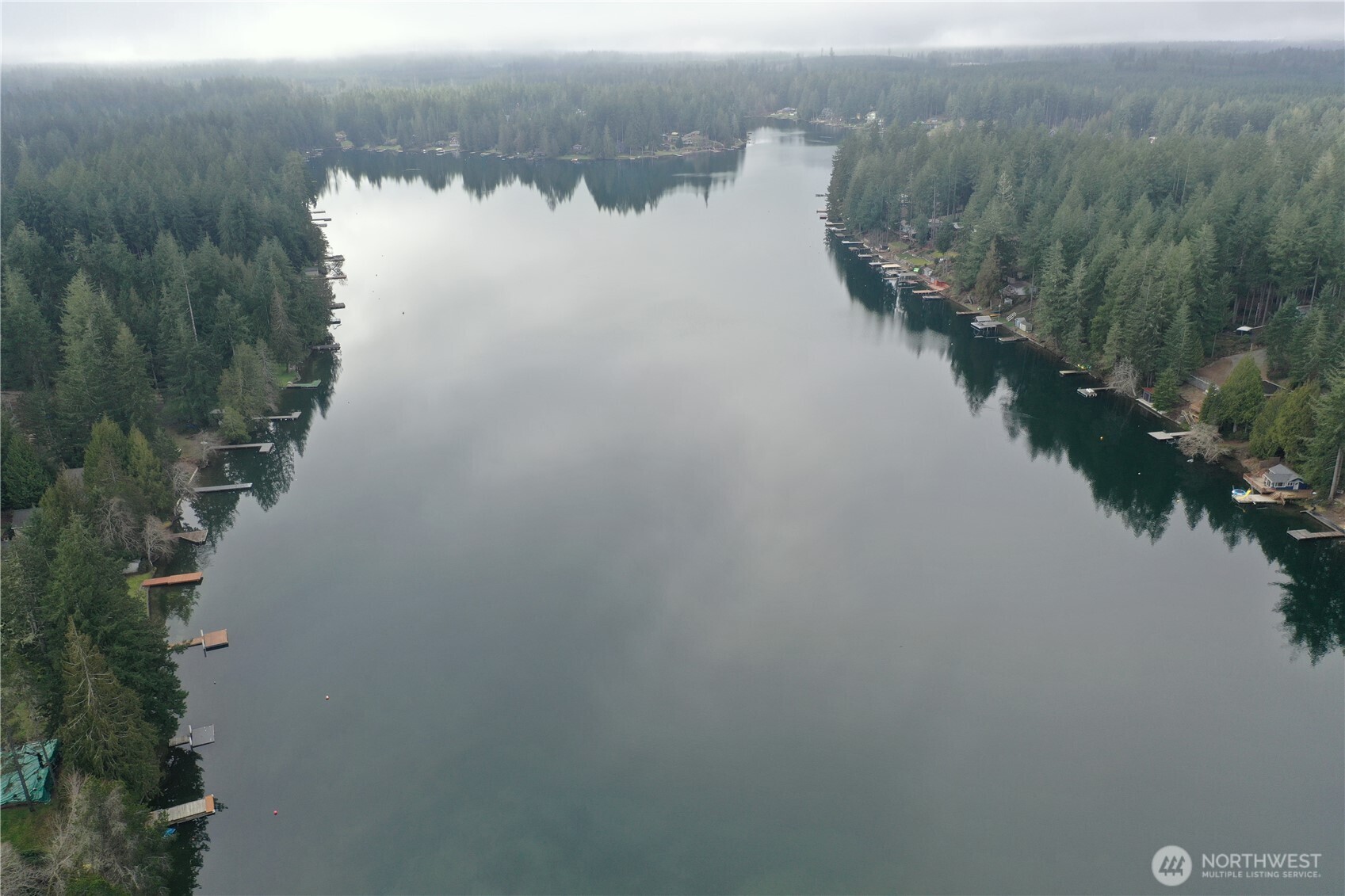 721 East Phillips Lake Loop Road Shelton, WA 98584 - Photo 23 of 30 a view of a lake in middle of forest
