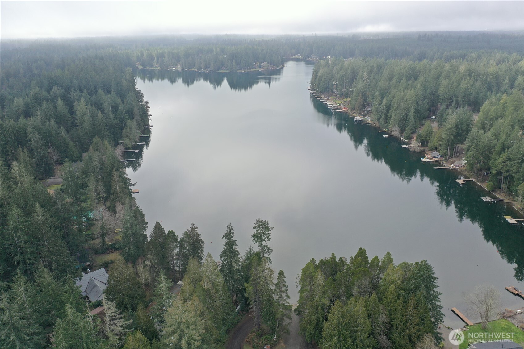 721 East Phillips Lake Loop Road Shelton, WA 98584 - Photo 24 of 30 a view of a lake from a yard