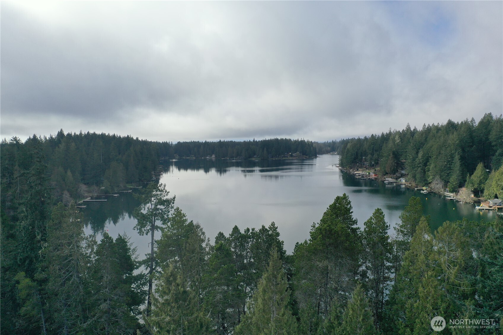 721 East Phillips Lake Loop Road Shelton, WA 98584 - Photo 28 of 30 a view of a lake from a yard