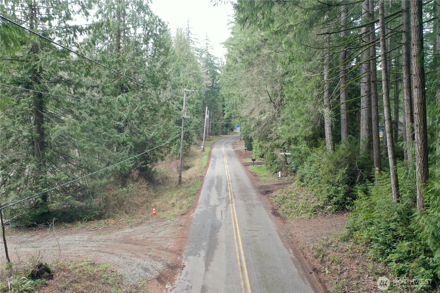 721 East Phillips Lake Loop Road Shelton, WA 98584 - Photo 5 of 30 a view of a pathway both side of yard