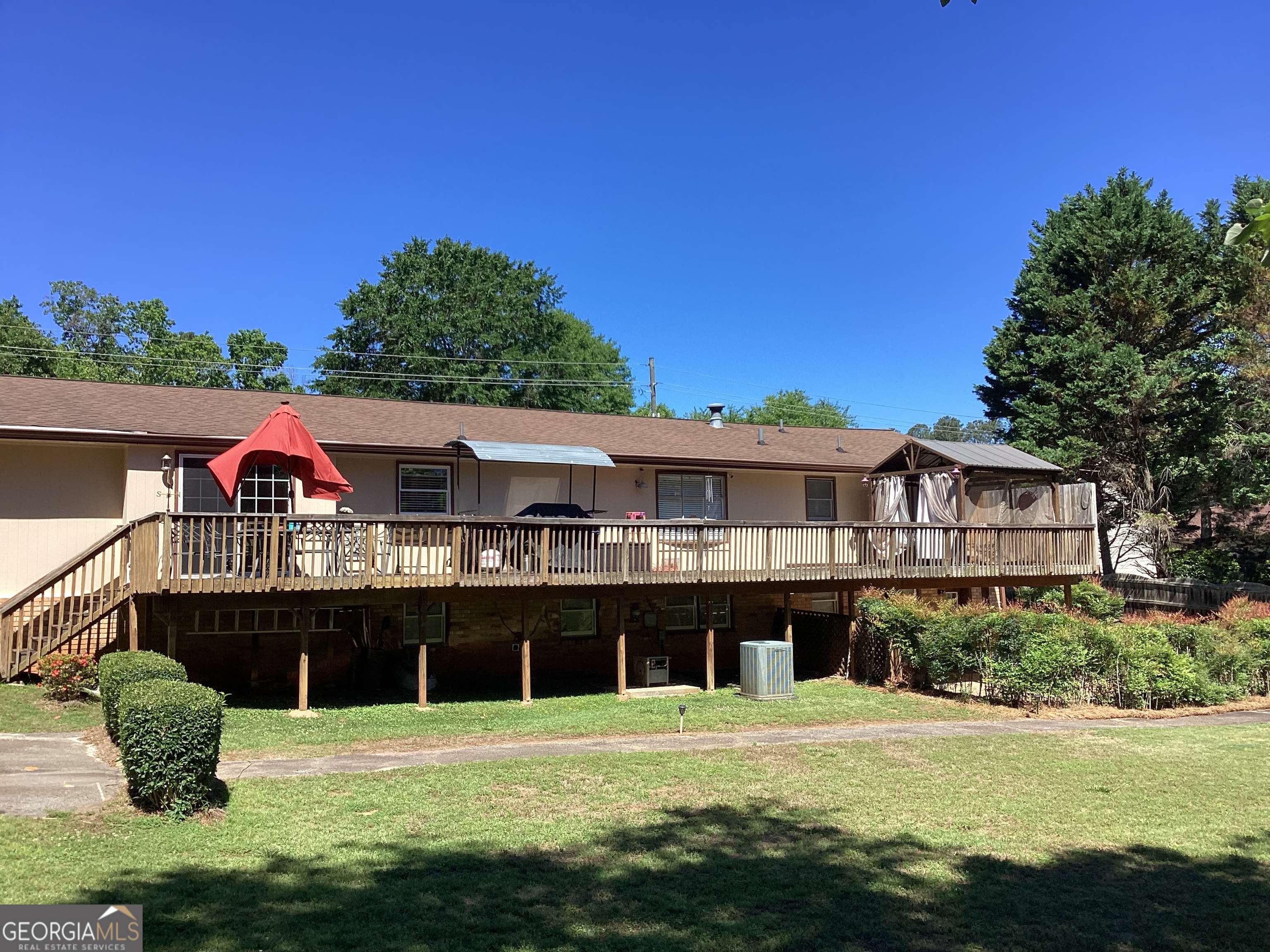 2779 Bob Cox Road Marietta, GA 30064 - Photo 2 of 48 a front view of a house with a yard