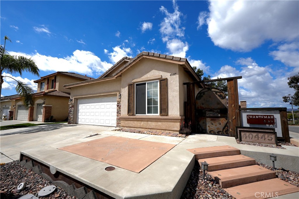 a front view of a house with yard