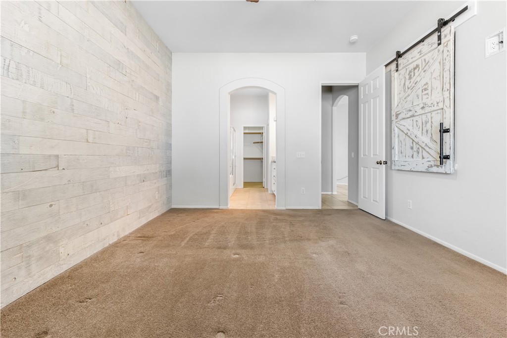 40445 Chantemar Way Temecula, CA 92591 - Photo 14 of 28 a view of an empty room with window and cabinet