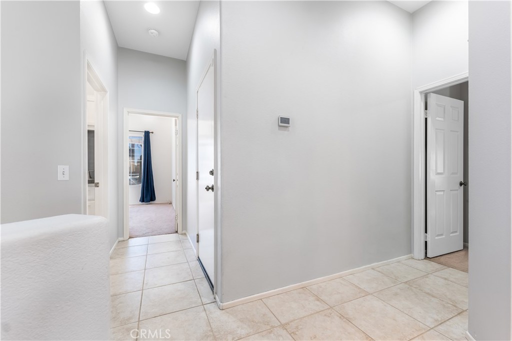 40445 Chantemar Way Temecula, CA 92591 - Photo 18 of 28 a view of a hallway to rooms