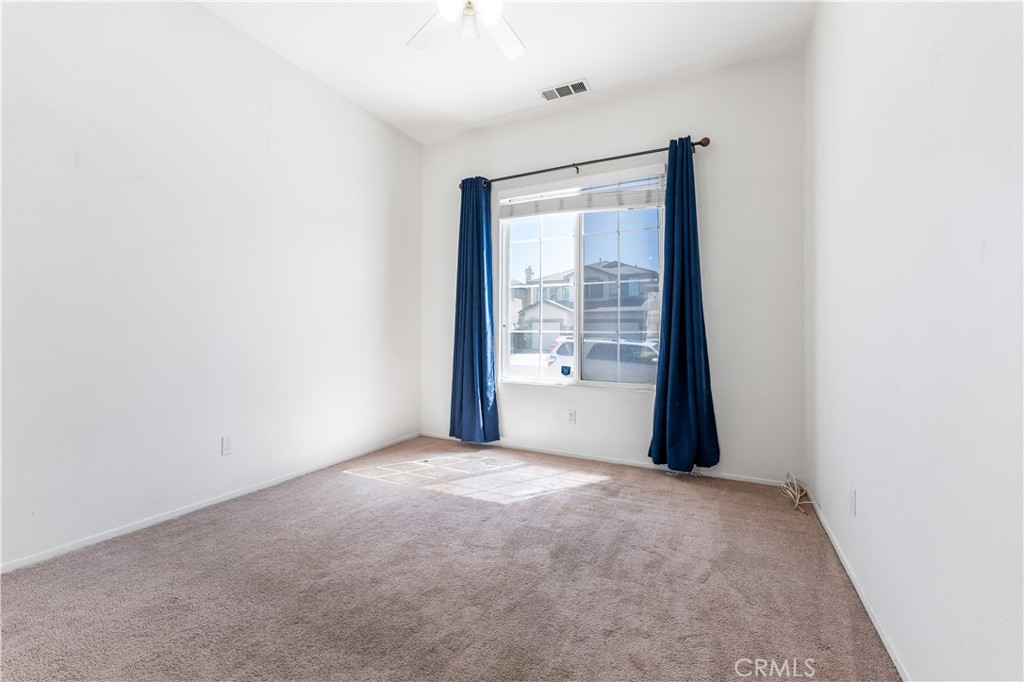 40445 Chantemar Way Temecula, CA 92591 - Photo 19 of 28 a view of an empty room with a window