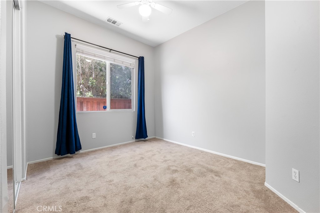 40445 Chantemar Way Temecula, CA 92591 - Photo 21 of 28 a view of an empty room with a window