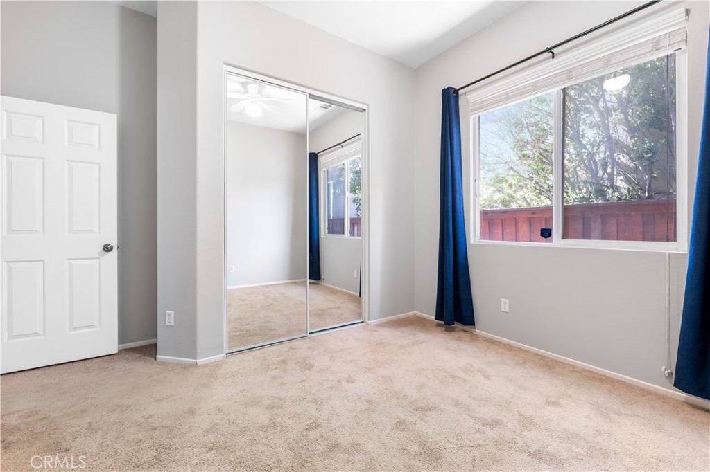 40445 Chantemar Way Temecula, CA 92591 - Photo 22 of 28 an empty room with windows