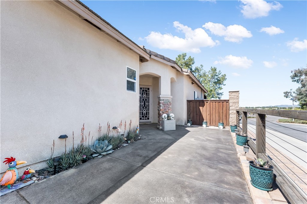 40445 Chantemar Way Temecula, CA 92591 - Photo 5 of 28 a front view of a house with garden